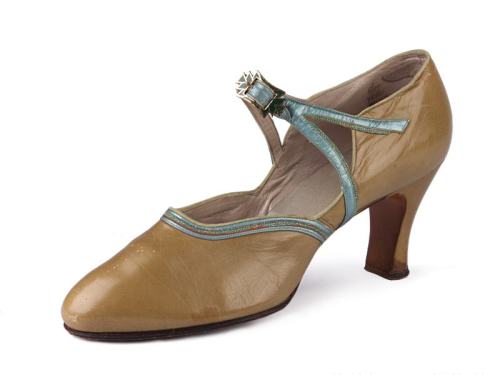 Olive colour leather pumps with waisted heel, closing with a strap with centrally located metal buck