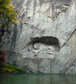 congenitaldisease:  Dying Lion Monument, Lucerne, Switzerland. A giant lion carved out of a wall of sandstone rock serves as a memorial for the soldiers from Switzerland who lost their lives during the French Revolution.