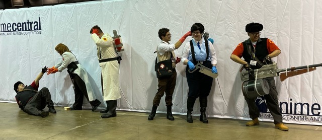 I can't believe I forgot to post these! Some fun tf2 cosplay pictures I got at ACEN 2023! I'm the short blu engineer