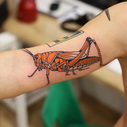 Grasshopper on my pal #patrykhilton #grasshopper #tattooing #orangegrasshopper #panterabydgoszcz #ma