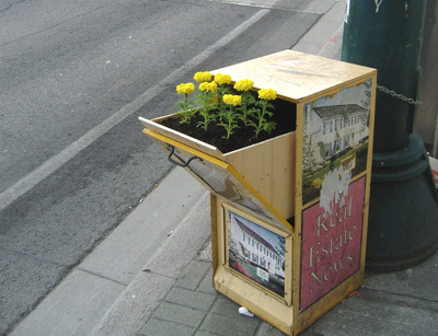 “A street artist named Posterchild has recently taken to turning unused newspaper boxes in Toronto into planters for flowers.” (via FishbowlLA)