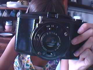 chloejane:  frogsandcrowns:  NEW TOY! isn’t it pretty!! Takes 620 film but i’m going to trim a 120 spool and use that. Takes holga/diana-ish pictures. (crappy webcam picture, sorry!)  WHAT IS IT?! :D   Oh yes, sorry, it’s a M.I.O.M photax boyer