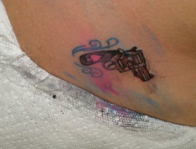 My friend just got this and posted it on her facebook. Little does she know that I operate a bad tattoo blog. -sob-