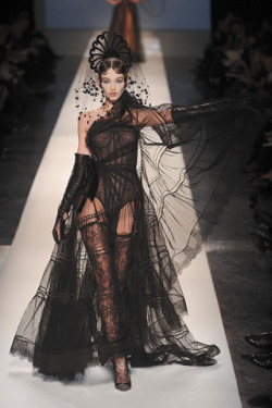 hidesawell:  Jean Paul Gaultier Spring 2009 Couture I AM THE QUEEN OF DELICATE BLACK LACE! Fear me and the little danglies from my headress.  Wow, I really like this one