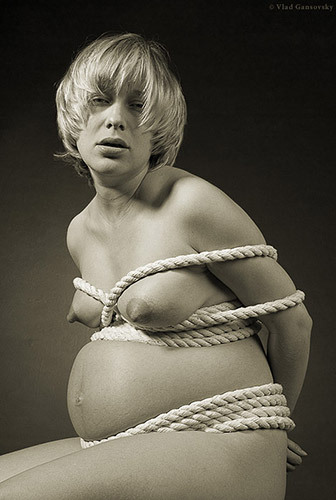 slaveryfortwo: uniquetrouble: libraryvixen:  tied to womanhood by Vlad Gansovsky