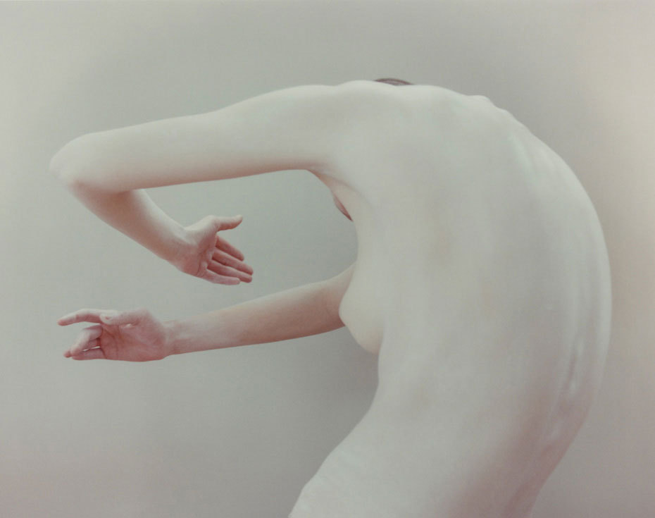 Kate (embrace) photo by Nadav Kander