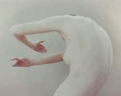 Kate (embrace) photo by Nadav Kander