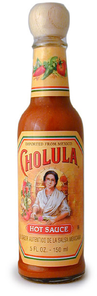 scrambledbits:  feinideas:  my faaaaavorite hot sauce. no joke, i pour some on every bite of my burrito when i eat at qdoba. so necessary.  It’s true. He does.  This stuff is very good and I got Jessica liking it. My plans of turning the white girl