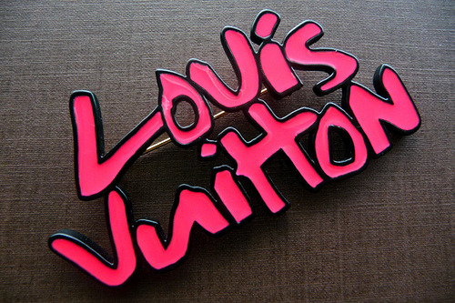 lovelikegraffiti:  neversayforeverrr:  smilegoo:  fuckyeahlouisvuitton:  Louis Vuitton Graffiti Brooch   want.  Mmmm Stephen Sprous x Louis Vuitton, YUMMY :]