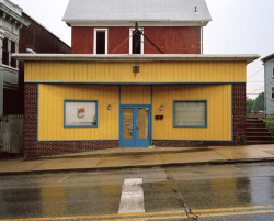 yellow store front with flaming dice photo