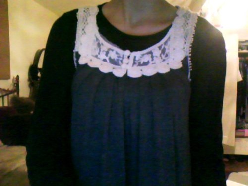 sorry for all the crappity webcam photos but my new dress came today!!!! It’s sooo pretty, it has a lace edged slip underneath and the neck is so lovely! I’ll take proper pictures soon.