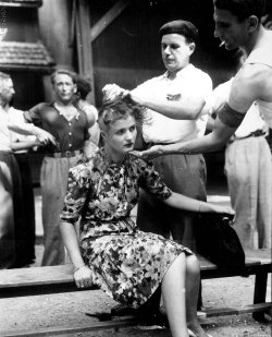 French civilians shave a woman’s head as punishment for collaborating with the Germans, 1944.