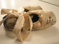 misplacedwhimsy:sweetcherrytulips:craftsforacause:    Natalie Portman, signed the ballet slippers she wore during her upcoming film Black Swan for the Crafts For A Cause auction.    