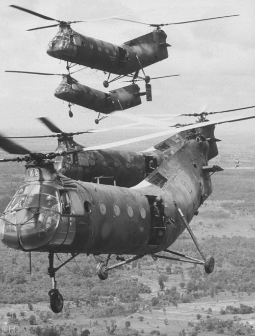 CH-21C Shawnees over Vietnam US crews & gunners, transport ARVN troops to battle areas near Cambodian border.Removed vertical stabilizers suggests 8th Trans units Photo by Larry Burrows for LIFE, 1964