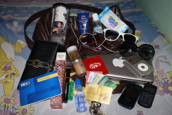 fuckyeahwhatsinyourbag:  plz follow me if you like whats inside my bag…xxx Submitted by: Xomichal