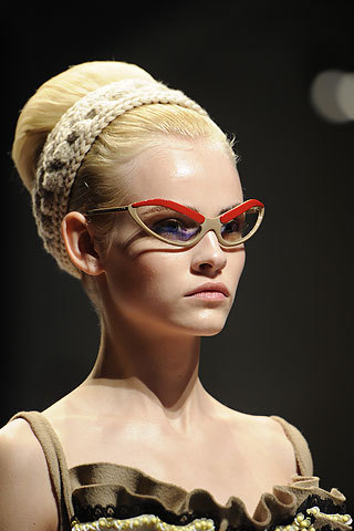 tulletulle:  The genius eyebrow sunglasses at Prada. 