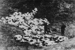Nazi officers shooting Jewish women, 1941.
