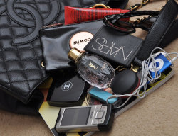 fuckyeahwhatsinyourbag:    Whats in My Bag?RUSSH Magazine, Mimco Pouch, Lucas Paw Paw, Chanel Sunnies, NARS  bronzer in Laguna, YSL  Parisienne Perfume, Ipod Chromatic, Chanel  Blush, M.A.C lip conitioner in Petting Pink, USB &amp; Old crap Nokia  mobile.