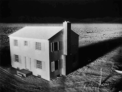 loveyourchaos:  thelovelybones:  Series taken by automatic camera showing effect of 35th atomic bomb test  on house built 1 mile from point of detonation, over period of 2.3  seconds until total demolition: 1-7/8th seconds on Yucca Flats. (via)  