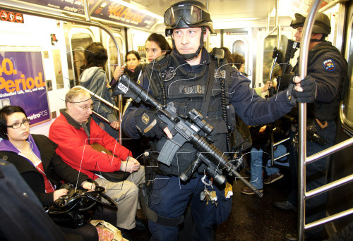 Is this helping? I know the NYPD are just trying to comfort nervous straphangers in light of the Moscow bombings, but I don’t think the presence of assault rifles helps. To stay sane while living in a metropolis like NY, you can’t focus on the chance...