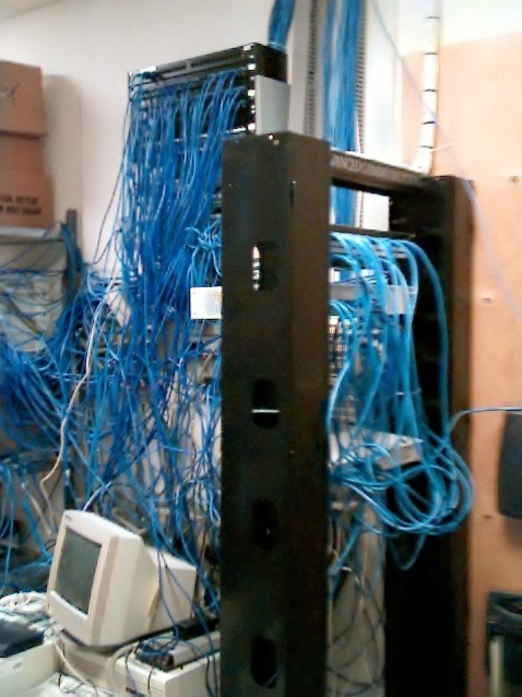 :0… This is just wrong… warning, before starting a new job… always check the network cabling closet first… and yes, we did clean this up.
I shot this picture with a Kodak PalmPix Camera attached to Palm IIIxe in January 2002.