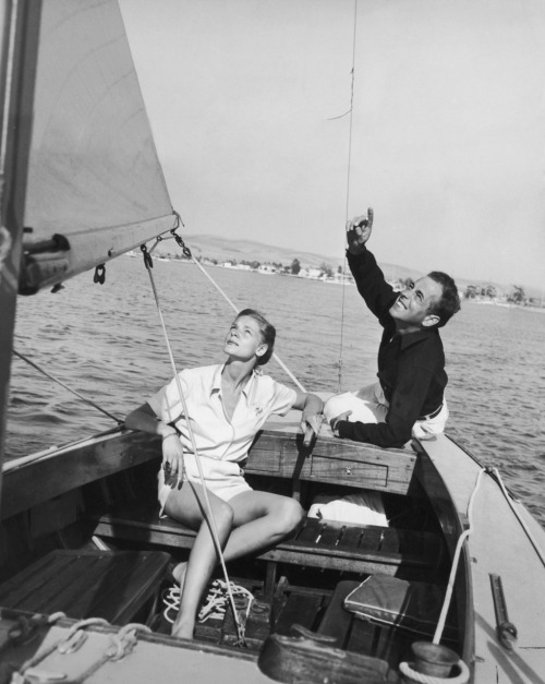 Bogie and Baby sailing circa 1945. (via fuckyeahlaurenbacall)