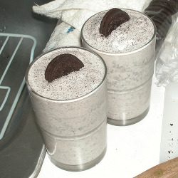  Oreo Milkshake Recipe What You Need! 4 tsp. chocolate syrup 8   OREO Cookies, divided 1-&frac12; cups milk 2 cups  vanilla ice cream, softened Make It!  SPOON 1 tsp. syrup into each of 4 glasses. Roll each glass to coat bottom and side of glass. Finely