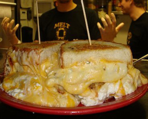 The Melt Challenge
Five pound grilled cheese with13 different cheeses, 3 slices of grilled bread served with fried and slaw.
(submitted by Krystal via The Melt)