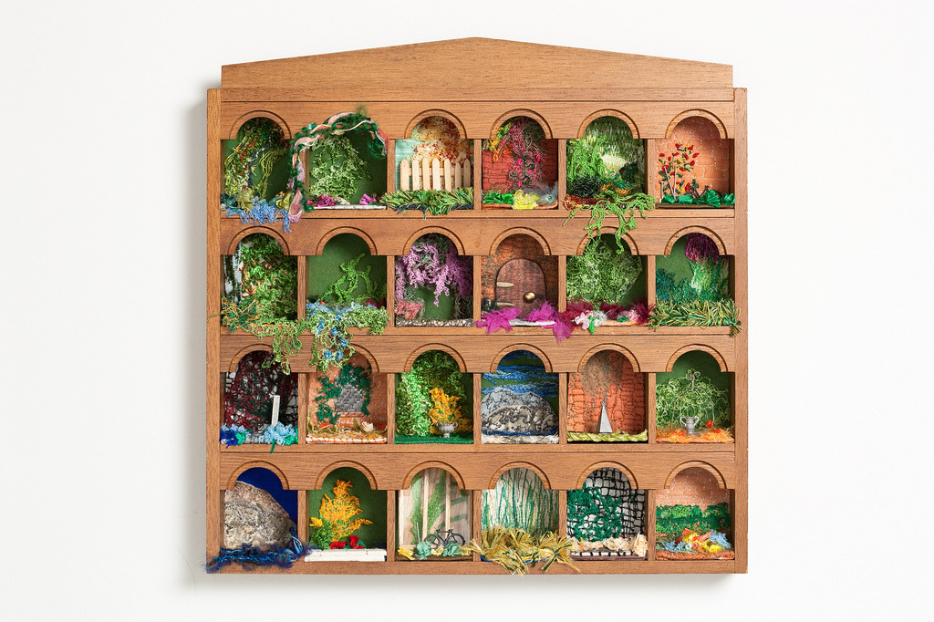 Another Jacqueline Glyde piece. 24 miniature gardens with embroidered accents, all inside a thimble box.