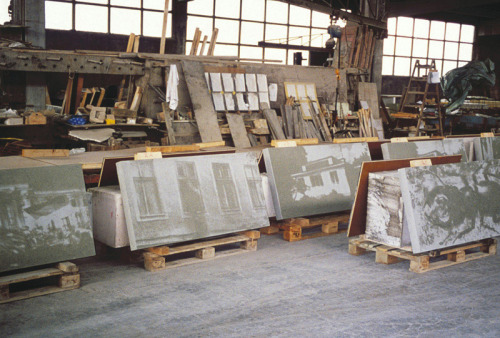 Concrete panels from the  Eberswalde Senior Technical School Library sitting in a warehouse prior to installation (via). Various found photographs, selected by artist Thomas Ruff, were superimposed into the formwork of the concrete, turning a...