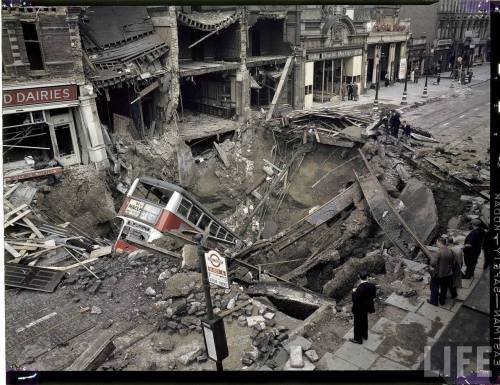 London Bus laying inside huge bomb crater after heavy German air raid bombing attacks during the Battle of Britainphoto by William Vandivert for LIFE, September 1940