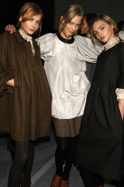 Snejana Onopka, Tanya Dziahileva, and Sasha Pivovarova backstage Chloe