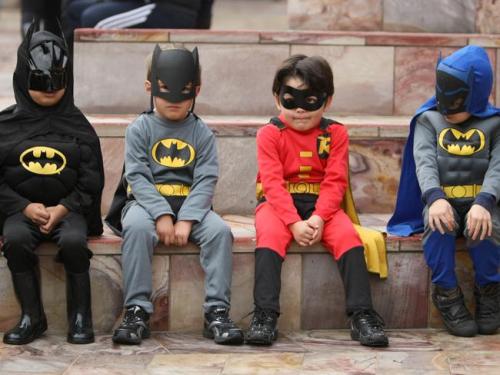 thedailywhat:  Photo of the Day: Three Batmen and a Robin sit on the stairs leading up to Fed Square in Melbourne, where the world record for “most number of people in Super Hero costumes in one location” was broken yesterday by 1,245 attendees wearing