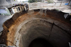 captainstevexxx:  deconstruct:  thirsties:  (via boyhood)   can someone explain this to me? the news story i read about it had nothing to do with it  It&rsquo;s a sinkhole, from a few years ago, in Guatemala. From what I understand, a few people were
