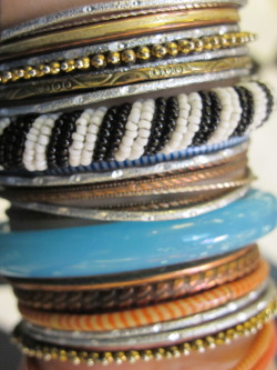 lovemamadolls:  Since I was a kid I wanted to be an adult wearing tons of bangles :)  Featuring my favorite beaded striped bracelet, turquoise glass bangle, gold bangles and recycled plastic bracelets.  RULE of my life I am not a size 4 therefore I