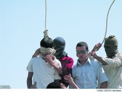 fuckyeahlgbt:  This is just to remember what gay life is like in Iran and what Islamic Sharia law really is about. The two young guys were not named. They were publicly hanged July, 19th 2005 in Edalat Square, Mashhad, Iran according to ISNA. One was