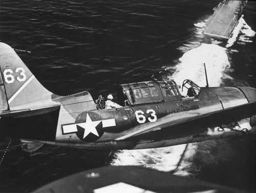 Vb-1 Sq. SB2C Helldivers approaching USS Yorktown Marianas, Pacific, July 1944