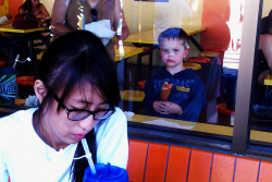 Apvivi:  The Kid Eating The Corn Dog Amused Me Haha. He Kept Missing His Mouth. 