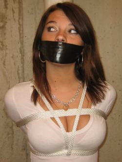 auctionhouse69:  johnnyadidas:  (via simplybondage, racemason-deactivated20100820-d)  (via johnnyadidas) She strains to here the negotiations. White slavery? It’s real? Maybe if she can convince her new owner to let her help, she can make a nice living