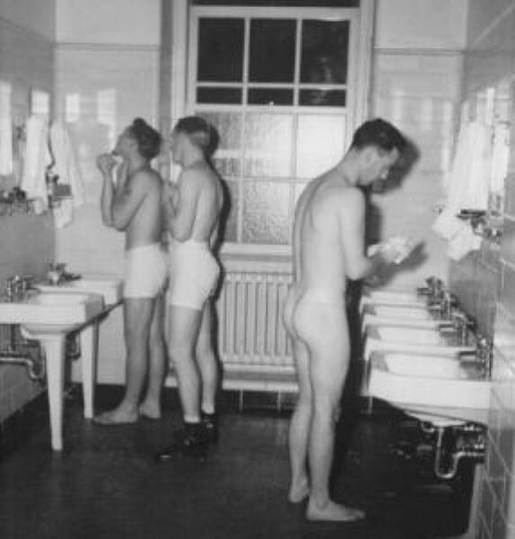 xac1998:  Vintage photo: Just guys in the restroom washing up and shaving. Nothing
