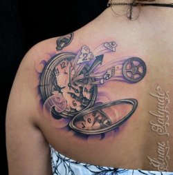 fuckyeahtattoos:  First part of my tattoo…broken watch (black and gray). The other part that’s missing right now it’s a space spiral (color) with lights coming from it and creating atoms. I basically wanted to create a contrast between what’s