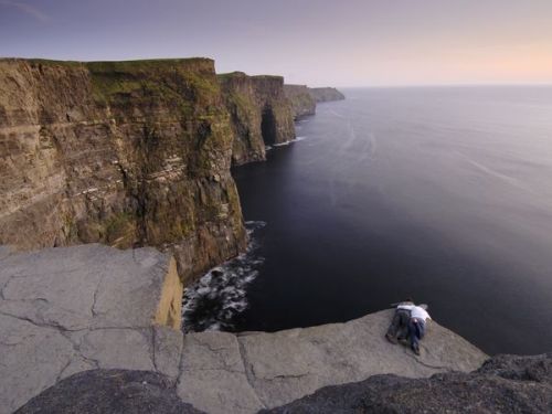 Photograph by Jim Richardson, National Geographic The craggy Cliffs of Moher wrap around the western