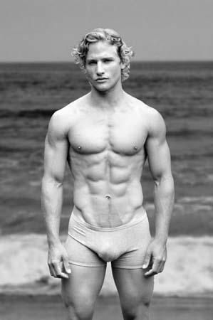 Bulging blond on the beach.