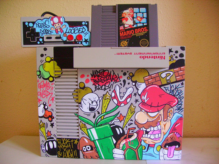 justinrampage:  Rad custom Mario inspired art on an old school NES. Nintendo Mario