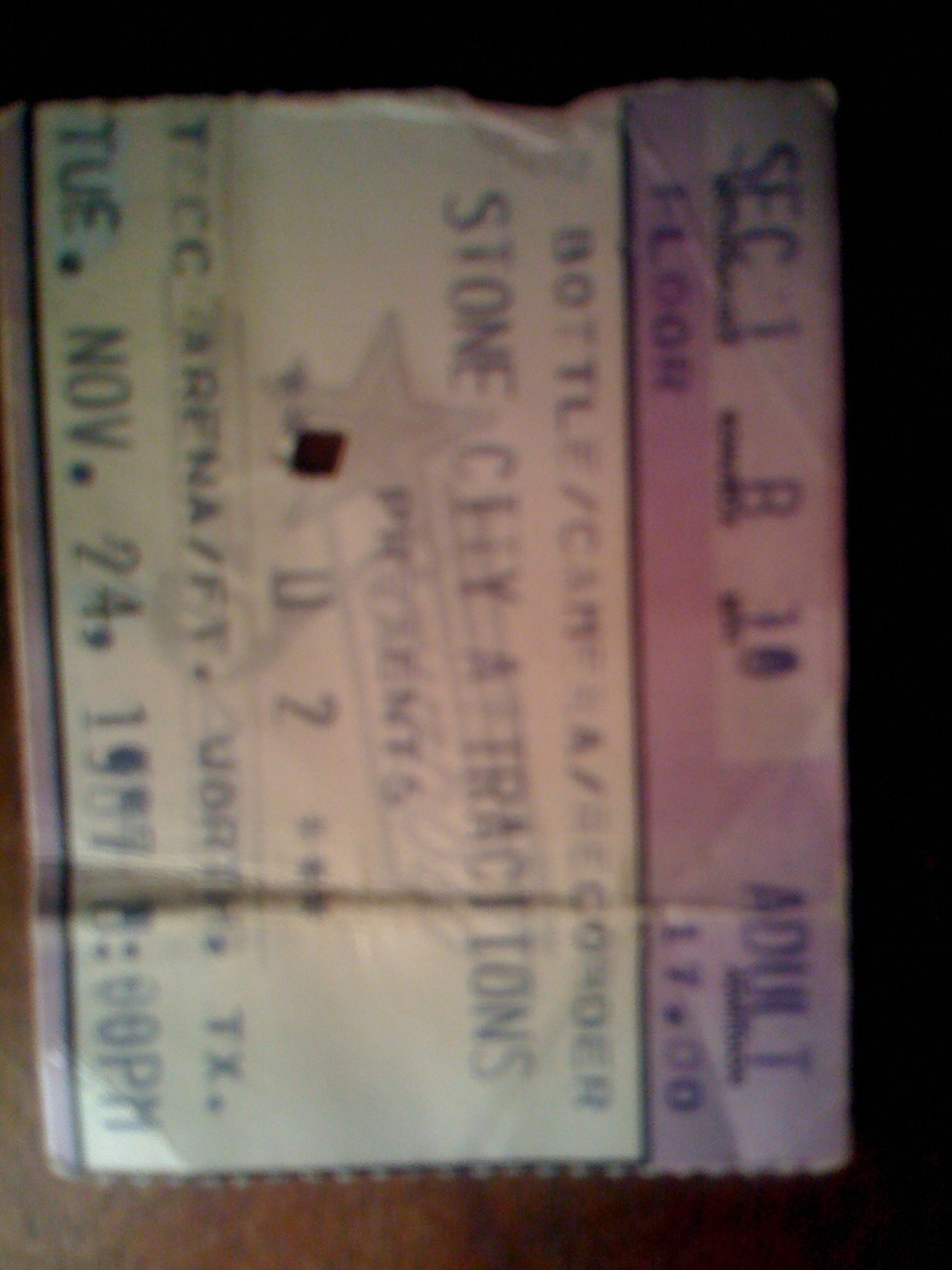 This mediocre photo shows the forged ticket stub (look closely at the Liquid Paper + pencil “TUE.” and 4 in “24”) that got Jeff and me back down to the floor for the second Fort Worth performance, which eventually allowed Jeff to get on stage with...