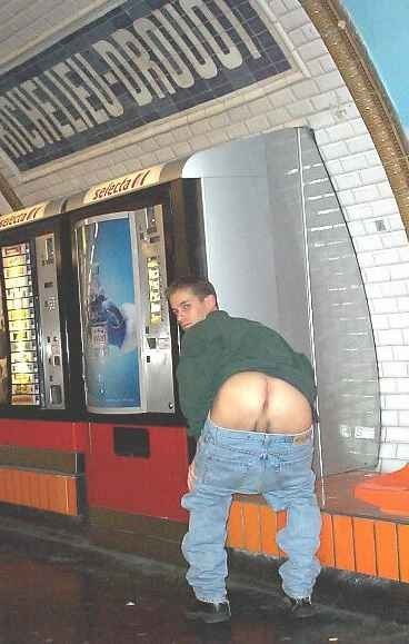 Mooning in the Paris underground.