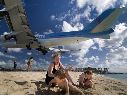 Photograph by Kent Miller Landing at Princess Juliana International Airport, a looming 747 thrills v