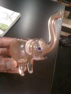 My Friend bought this cutest little pipe on Bourbon street over the weekend! You smoke out of the trunk! The bowl is on the back of this elephant. So neat