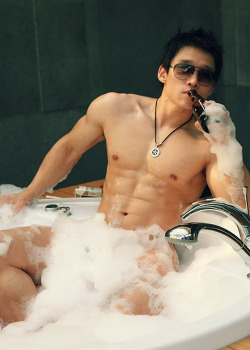  why is he wearing sunglasses in the bathtub?
