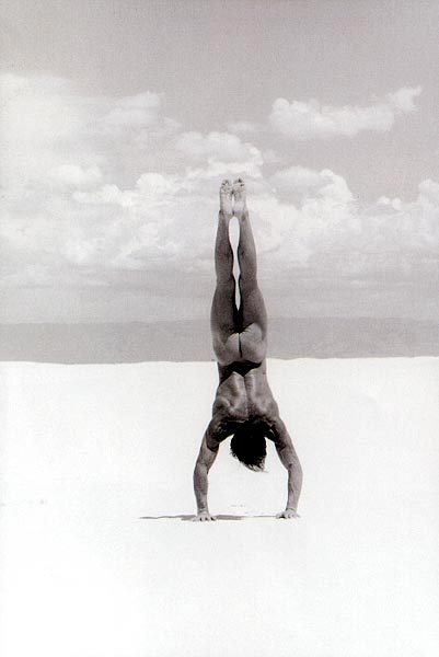 Porn Pics Naked handstand on the beach.